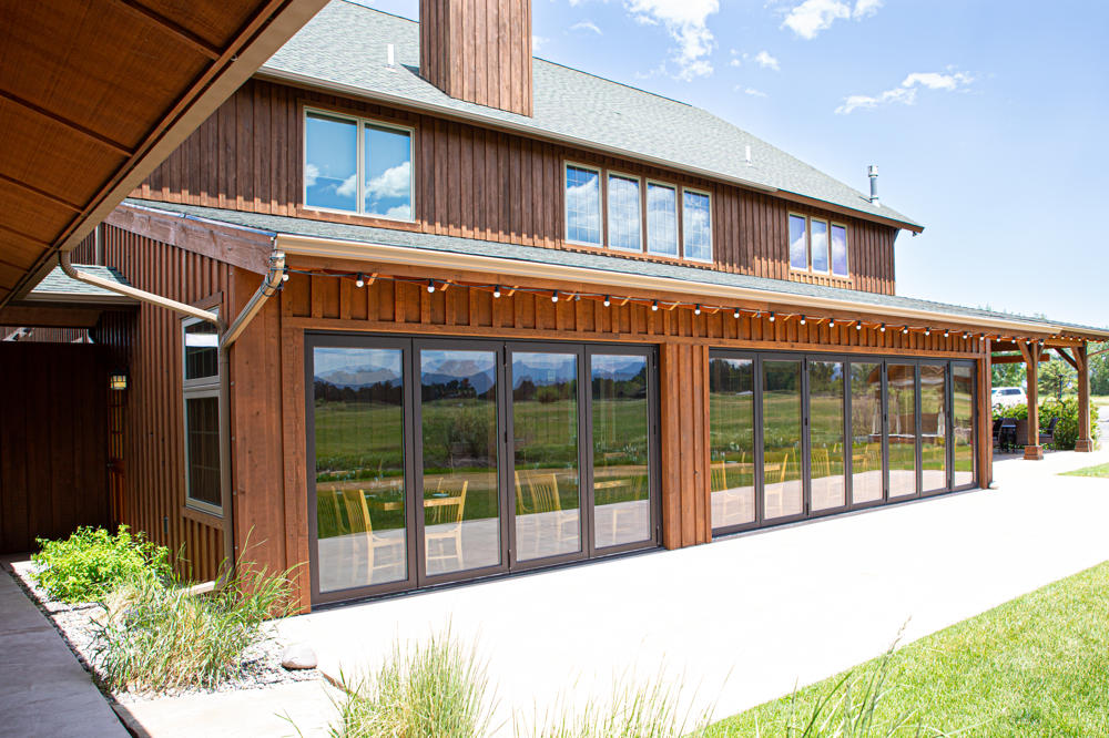 Modern wooden house with large glass doors