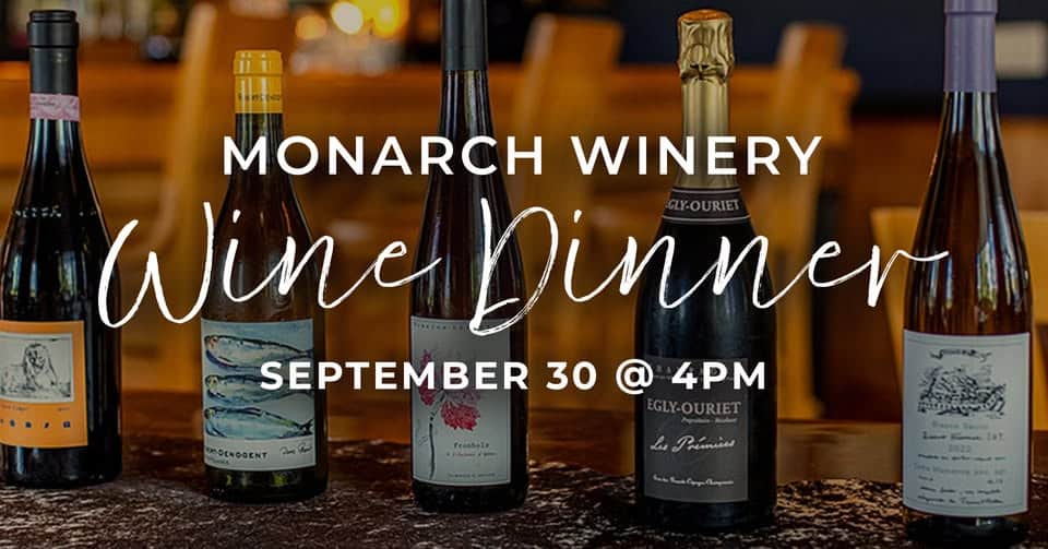 Five wine bottles advertise Monarch Winery Wine Dinner